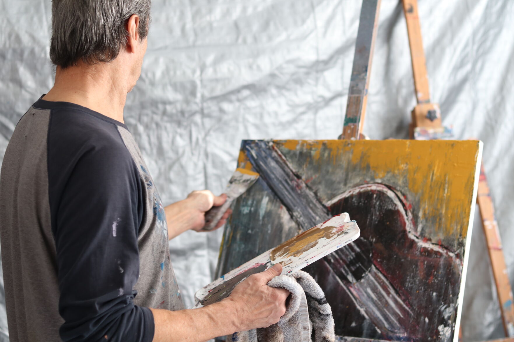 2. As a full-time visual artist, Dave Manousos brings characters to life through layers of paint and textured gesso, creating bold, graphic, abstract paintings that offer a visual banquet in his Sutter Creek studio..jpeg